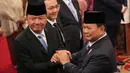 Sebelumnya, Presiden Prabowo Subianto resmi mengumumkan nama jajaran menteri, dan kepala badan setingkat menteri dalam Kabinet Prabowo-Gibran pada Minggu (20/10/2024) malam. (AP Photo/Achmad Ibrahim)