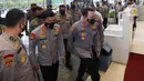 Kapolri Jenderal Idham Azis bersama Komjen Listyo Sigit Prabowo (kanan) tiba di Gedung Nusantara II DPR, Kompleks Parlemen, Senayan, Jakarta, Rabu (20/1/2021). Komjen Listyo akan menjalani uji kelayakan dan kepatutan (fit and proper test) calon Kapolri di Komisi III DPR. (Liputan6.com/Angga Yuniar)