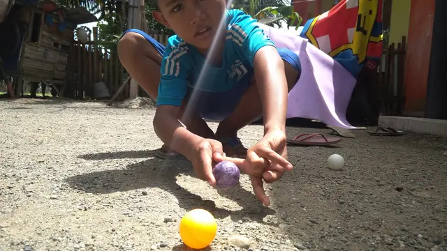 Katok, permainan tradisional yang sudah jarang dimainkan anak-anak di Serambi Makkah.