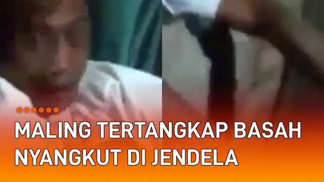 Beredar sebuah video seorang maling tertangkap basah nyangkut di jendela.