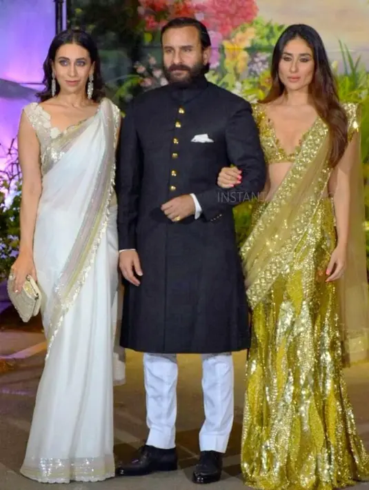 Saif Ali Khan dan sang istri, Kareena Kapoor terlihat hadir di pesta pernikahan Sonam Kapoor. Tak hanya berdua, mereka terlihat bersama dengan Karisma Kapoor. (Foto: instagram.com/instantbollywood)