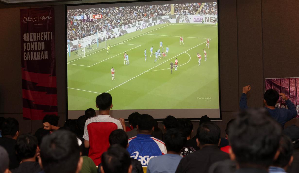 <p>Suasana acara Roaring night Manchester City vs Arsenal di Ibis Style Jakarta, Tanah Abang, Minggu (31/3/2024). (Bola.com/M Iqbal Ichsan)</p>