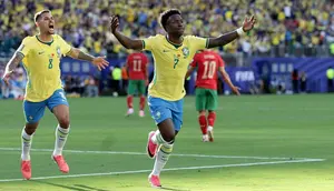 Pemain Timnas Brasil, Vinicius Junior, merayakan gol yang dicetaknya ke gawang Maroko dalam laga pertama Grup C Piala Dunia 2026 di East Rutherford, New Jersey, Minggu (14/6/2026) pagi WIB. (AP Photo/Adam Hunger)