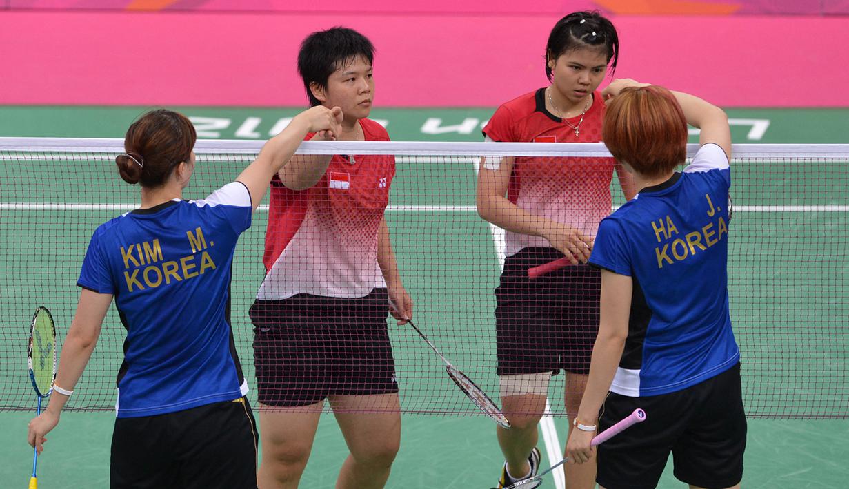 Pada laga tersebut, Greysia Polii/Meiliana Jauhari "mengalah" 1-2 (21-18, 14-21, 12-21) dari pasangan Korea yang juga beurusaha "mengalah", Ha Jung-eun/Kim Min-jung yang akhirnya juga didiskualifikasi. (Foto: AFP/Adek Berry)