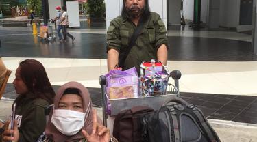 Kisah Asnur Sekeluarga Batal Terbang Pakai Sriwijaya Air SJ 182 karena Swab Test PCR