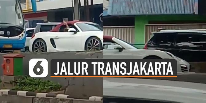 VIDEO: Viral Mobil Sport Masuk Jalur Transjakarta