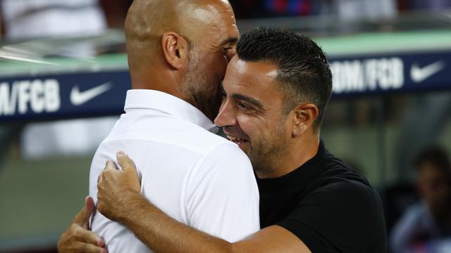 Duel pertama sebagai pelatih antara Xavi dan Guardiola-AP