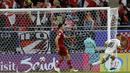 Pemain Irak, Osama Rashid, mencetak gol ke gawang Indonesia pada laga perdana Grup D Piala Asia 2023 di Ahmed bin Ali Stadium, Senin (15/01/2024). (AFP/Karim Jaafar)
