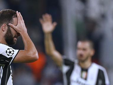 Juventus bermain imbang tanpa gol melawan Sevilla pada laga Liga Champions Grup H di Juventus Stadium, Turin, Kami (15/9/2016) dini hari WIB. Gonzalo Higuain pun gagal tampil cemerlang. (AFP/Marco Bertorello)
