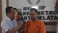 Panca Darmansyah ayah pembunuh empat anaknya di Jagakarsa saat jumpa pers di Mapolres Metro Jakarta Selatan, Kamis (21/12/2023). (Merdeka.com).