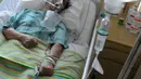 Benny Panjaitan saat dirawat di rumah sakit Sari Asih, Tangerang, Banten, (31/12). Benny dirawat di ruang ICU rumah sakit Sari Asih Tangerang. (Liputan6.com/Helmi Afandi)
