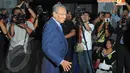 Saat datang, Mahathir hanya mengumbar senyuman tanpa memberikan keterangan apapun kepada awak media yang sejak siang sudah menunggunya, Senin (14/4) (Liputan6.com/Herman Zakharia).