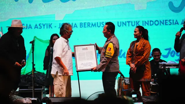 Kapolri Jenderal Listyo Sigit Prabowo saat menghadiri acara bertajuk Jogja Asik yang diselenggarakan di Yogyakarta, Jumat (19/1/2024).