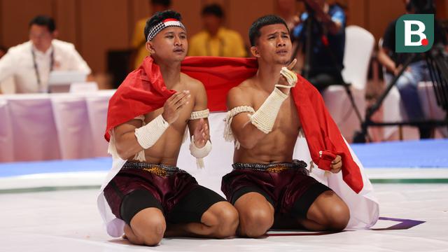 Gema Nur Arifin dan Yazid Hanifam Kurniawan mempersembahkan medali emas SEA Games 2023 dari cabang olahraga (cabor) martial arts kun bokator Men's Duo Group Performance.