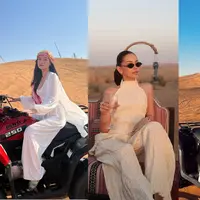 Alyssa Daguise, Caitilin Halderman, dan Aaliyah Massaid menghabiskan waktu liburan di Dubai Desert. Ketiganya tampil dengan gaya busana berbeda yang hadirkan vibes ala putri sultan dan musafir. Siapa yang paling kece? [@caitlinhalderman @alyssadaguise @aaliyah.massaid]