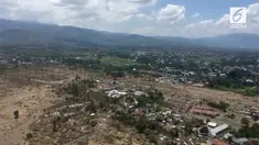 Basarnas melakukan pantauan udara tentang kondisi Palu pascagempa dan tsunami pada 28 September 2018.
