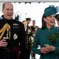 Pangeran William dan Kate Middleton menikmati minuman Guinness bersama anggota Batalyon 1 Pengawal Irlandia, setelah Parade Hari St Patrick di Barak Mons di Aldershot, barat daya London, pada bulan Maret 17 Agustus 2023. (Dok: Chris Jackson / KOLAM RENANG / AF)