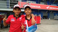 Dua pebalap Indonesia, Muhammad Adenanta dan Mario Suryo Aji, beberapa kali menjajal Sirkuit Buriram, Thailand. Musim depan sirkuit ini akan menjadi tuan rumah MotoGP. (Bola.com/Muhammad Wirawan Kusuma)