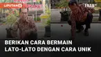 Seorang bapak berikan cara bermain lato-lato dengan cara unik