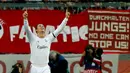 Selebrasi Cristiano Ronaldo usai memastikan Real Madrid lolos ke babak final Liga Champions, (30/4/2014). (REUTERS/Ralph Orlowski)