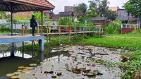 Bozem penampung air di Kelurahan Blimbing, Kota Malang, kondisinya memprihatinkan padahal bisa berfungsi mengurangi masalah banjir di Malang (Liputan6.com/Zainul Arifin)