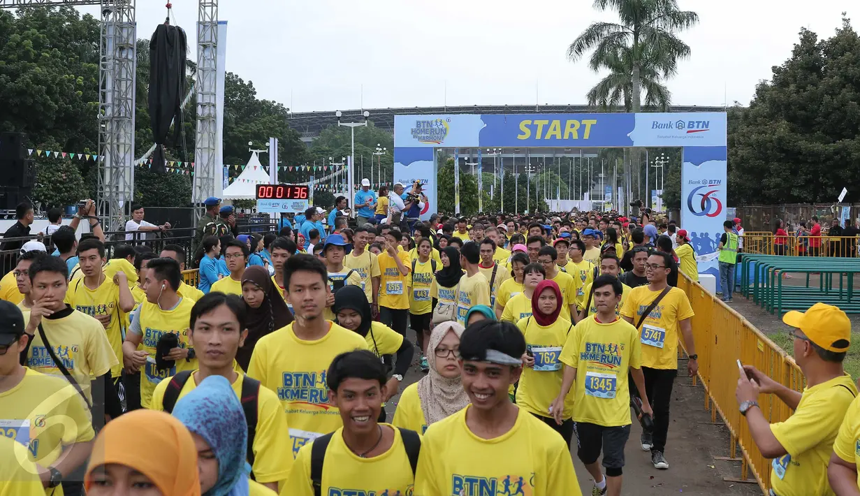 Peserta antusias mengikuti home run in harmony di Senayan, Jakarta, Minggu (21/2). Di usia yang semakin matang, BTN semakin memantapkan posisinya sebagai bank berplat merah yang cukup ekspansif di sektor pembiayaan perumahan. (Liputan6.com/Angga Yuniar)