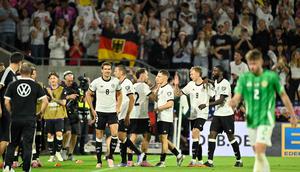 Pemain Jerman merayakan keunggulan sementara 2-1 dalam pertandingan kualifikasi Piala Dunia 2026 zona Eropa grup A melawan Irlandia Utara di RheinEnergieStadion, Jerman, pada 7 September 2025 waktu setempat atau Senin (8/9/2025) dini hari WIB. (INA FASSBENDER/AFP)