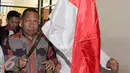 Jannes Johan Karubaba saat akan menjalani sidang perdana di Gedung Tipikor, Jakarta, Senin (13/7/2015). Karubaba diduga melakukan korupsi pengadaan "Detailing Engineering Design" di Sungai Mamberamo dan Urumka. (Liputan6.com/Helmi Afandi)