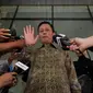 Panitera MK Kasianur Sidauruk memilih bungkam soal pemeriksaannya di KPK, Jakarta, Senin (15/12/2014). (Liputan6.com/Miftahul Hayat)