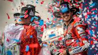 Francesco Bagnaia dari Ducati Lenovo merayakan kemenangan di MotoGP Amerika Serikat 2025. (Bola.com/motogp.com)