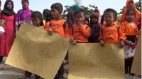 Puluhan Anak TK di Tegal Demo Geruduk Kantor Kepala Desa Tolak Pembongkaran Sekolahnya (Liputan6.com/Fajar Eko Nugroho)