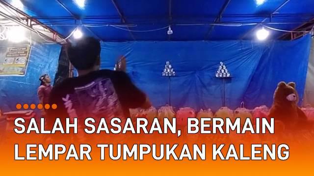 Nasib apes dialami seorang pria ketika bermain lempar tumpukan kaleng