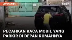 Aksi seorang pria pecahkan kaca mobil di pinggir jalan mengundang perhatian
