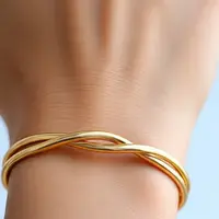 Ilustrasi Model Gelang Emas Crossover (Sumber Gambar: Meta AI)