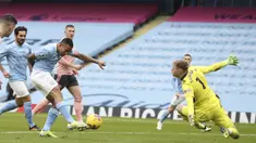 Pertandingan baru berjalan sembilan menit, Manchester City berhasil memimpin lebih dulu melalui gol yang diciptakan oleh Gabriel Jesus. (Foto: AP/Pool/Martin Rickett)