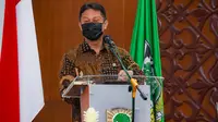 Menteri Kesehatan RI Budi Gunadi Sadikin memberikan orasi ilmiah bertajuk "Kebijakan Pemerintah Dalam Penanganan Pandemi COVID-19" di Fakultas Hukum Universitas Andalas Sumatera Barat pada Selasa, 12 Oktober 2021. (Dok Kementerian Kesehatan RI)