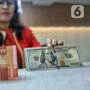 Ditekan Suku Bunga The Fed, Rupiah Anjlok ke 18.027 per Dolar AS