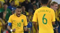 Ekspresi striker tim nasional Brasil, Neymar, usai mencetak gol ke gawang Jerman, pada pertandingan final cabang sepak bola Olimpiade 2016, di Stadion Maracana, Rio de Janiero, Sabtu atau Minggu (21/8/2016) dini hari WIB. (AFPLuis Acosta). 