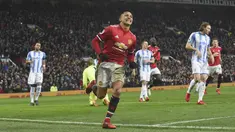 Pemain anyar Manchester United, Alexis Sanchez merayakan golnya ke gawang Huddersfield Town pada laga Premier League di Old Trafford, Manchester, (3/2/2018). MU menang 2-0. (AFP/Paul Ellis)