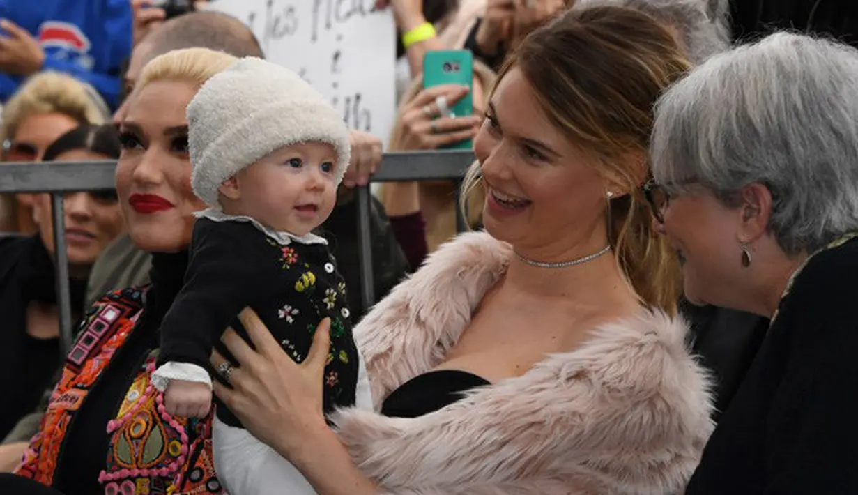 Sejak kelahiran anak pertamanya, pasangan muda ini memang ingin segera menambah momongan dan memberikan adik untuk Dusty. Pasalnya mereka sangat menikmati perannya menjadi orang tua. (AFP/Mark RALSTON)