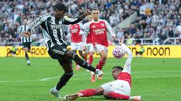 Arsenal meraih kemenangan krusial di pertandingan pekan keenam Premier League musim 2025/2026. Bertamu ke markas Newcastle, The Gunners sukses menang dengan skor tipis 1-2. (AP Photo/Jon Super)