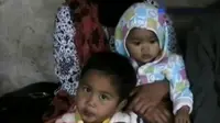 Bayi dan Balita Pengungsi Sinabung Membutuhkan Susu