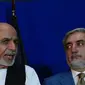 Dua capres Afghanistan, Ashraf Ghani (kiri) dan Abdullah Abdullah (AFP)