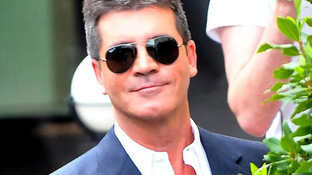 simon-cowell-jadi-ayah-130908b.jpg