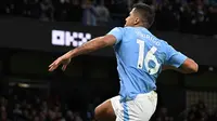 Gelandang Manchester City, Rodri, mencetak gol ke gawang Sheffield United. (Bola.com/Dok.AFP/OLI SCARFF).