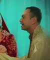 Nagita Slavina dan Raffi Ahmad didapuk menjadi model video klip lagu terbaru Ahmad Dhani dan Raisa. Keduanya pun tampil mengenakan pakaian khas pasangan India. [YouTube Dewa19]