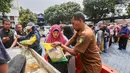 Gerakan Pangan Murah di Kota Tangerang digelar Dinas Ketahanan Pangan (DKP) yang dilaksanakan di 39 lokasi sejak awal Februari 2024. (Liputan6.com/Angga Yuniar)