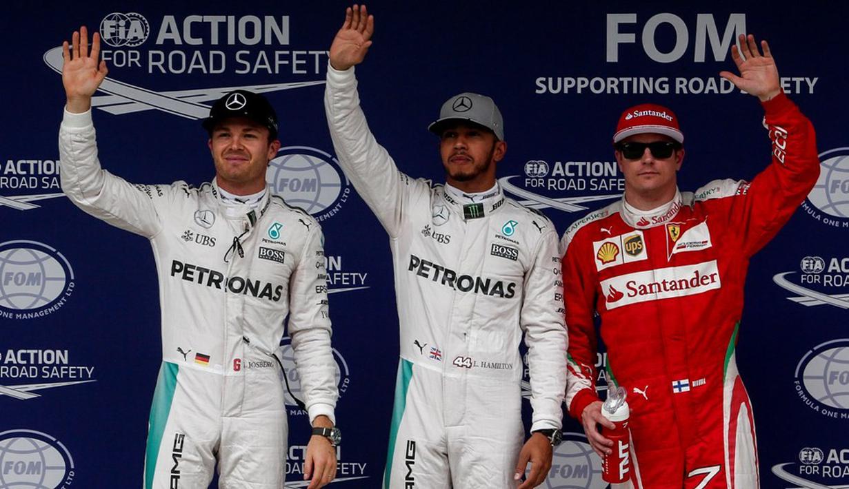 Tiga pebalap yang akan start di posisi depan, Nico Rosberg, Lewis Hamilton, dan Kimi Raikkonen dalam balapan F1 GP Brasil di Sirkuit Interlagos, Minggu (13/11/2016). (AFP/Miguel Schincariol)