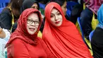 Politisi yang terjerat kasus korupsi, Angelina Sondakh dan Dewi Yasin Limpo saat acara sosialisasi Empat Pilar di Rutan Pondok Bambu, Jakarta, (27/5). Mengenakan pakaian serba merah, keduanya mendengarkan pemaparan Ketua MPR RI (Liputan6.com/Yoppy Renato)