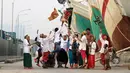 Umat Muslim merayakan Idul Fitri 1435 H di Pelabuhan Sunda Kelapa, Jakarta, Senin (28/7/14). (Liputan6.com/Miftahul Hayat)